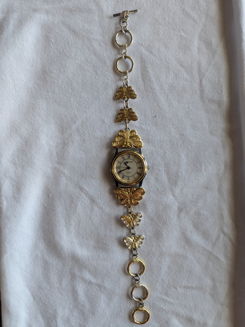 Two Toned Montana Silversmith Watch with adjustable Butterfly Band